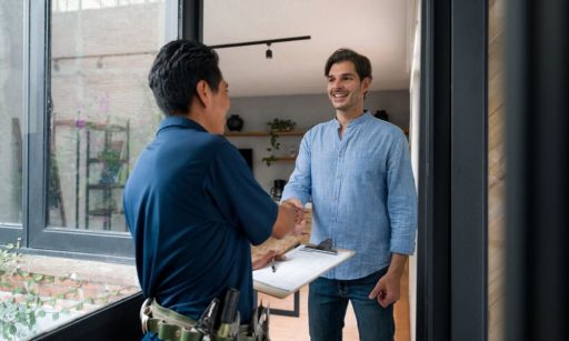 A property manager meets with a vendor about property maintenance