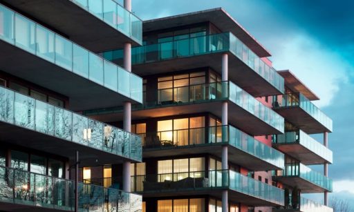 Modern BTR community apartments with glass balconies.