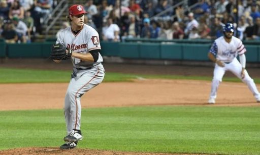 Shea Murray pitching on the mound during a baseball game.