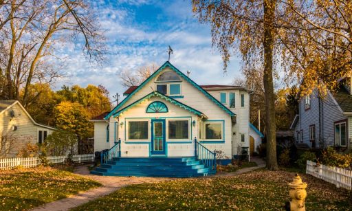 A rental home sits in a yard, owned by a property owner who became an accidental landlord.